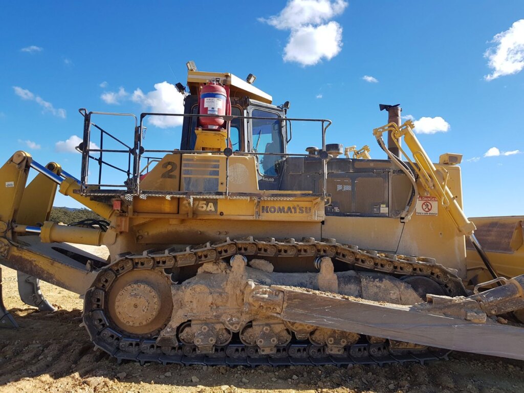 Muster Fire Suppression on a Komatsu-D375A-5 Excavator